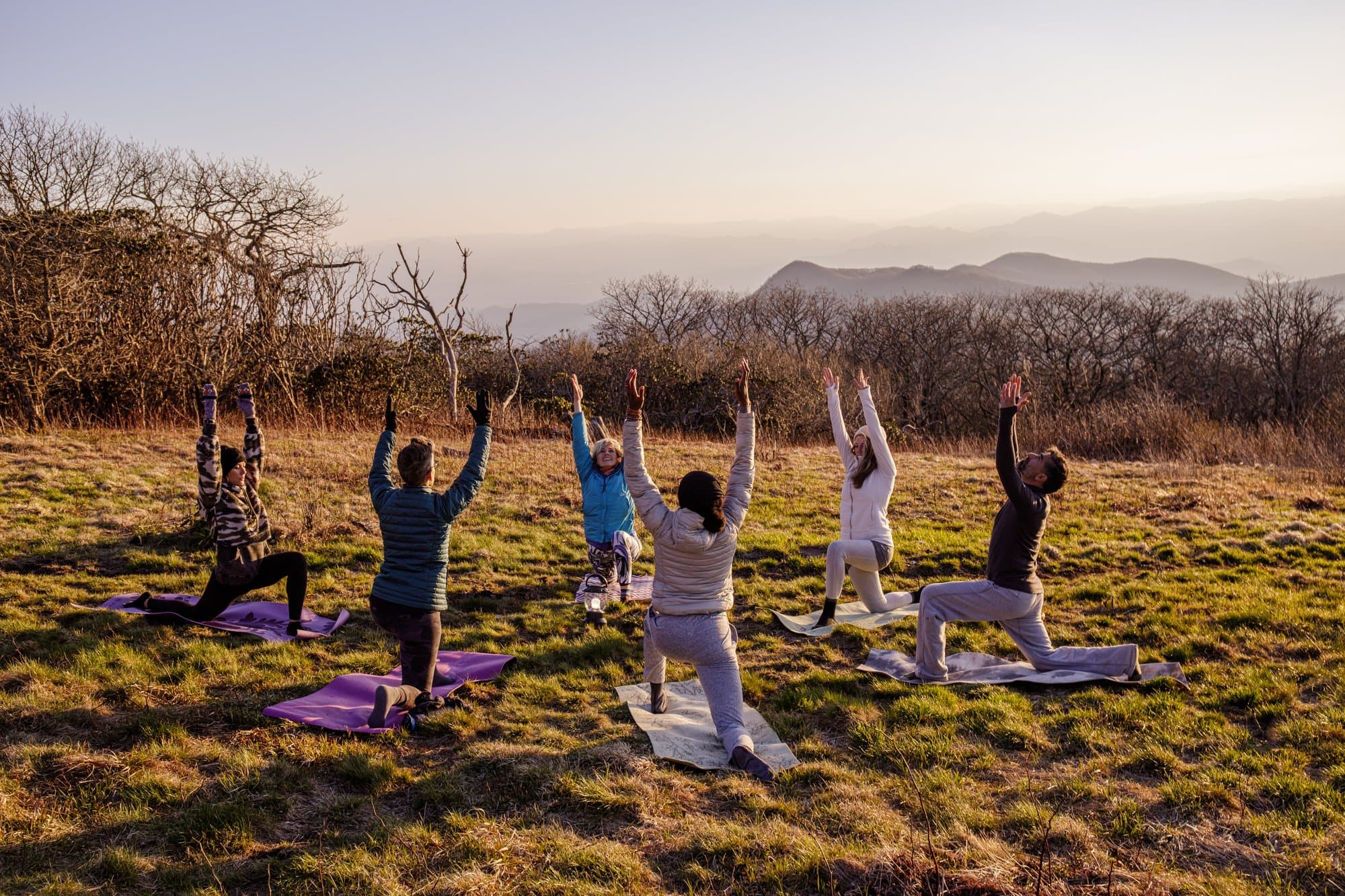 Asheville’s Ultimate Team Building Adventures Group yoga with Asheville Wellness Tours