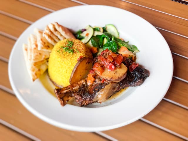 Enjoy Our Amazing Lamb Shank Entrees. They Are Tender, Fall-Off-The-Bone, & Delicious! Usually Served With Sautéed Veggies, Rice Pilaf, & Warm Toasted Pita Bread. Enjoy Our Amazing Lamb Shank Entrees. They Are Tender, Fall-Off-The-Bone, & Delicious! Usually Served With Sautéed Veggies, Rice Pilaf, & Warm Toasted Pita Bread.